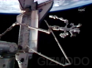 Illustration for article titled First Pictures of Completed Dextre Giant Space Robot